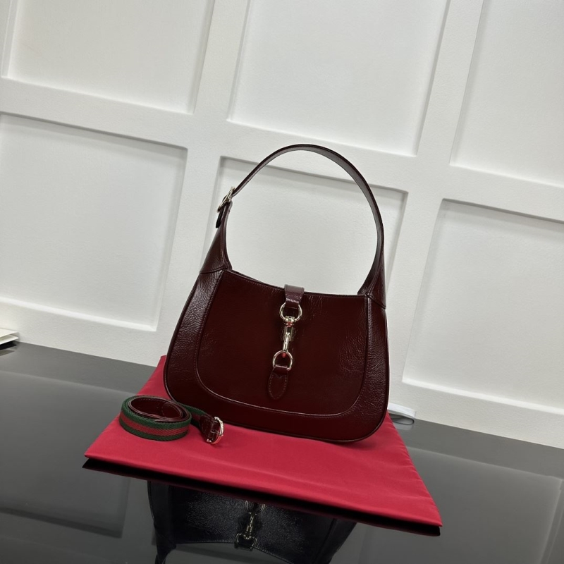 G*u*i top handle bags
